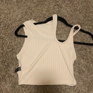 never been worn trendy asymmetrical top
